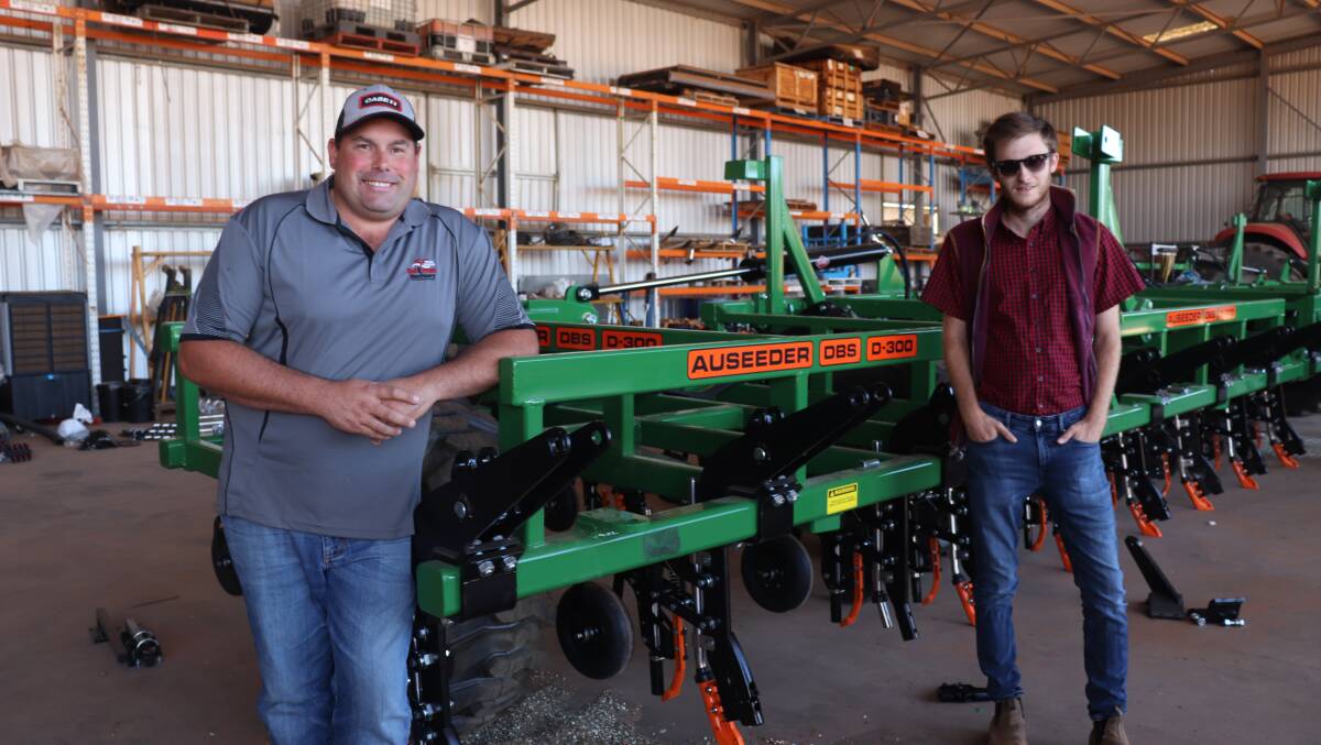 Mr Crookes (left) and Mr McLintock with the Ausplow DBS (deep blade system) D series which can be upgraded to fit the latest tynes.