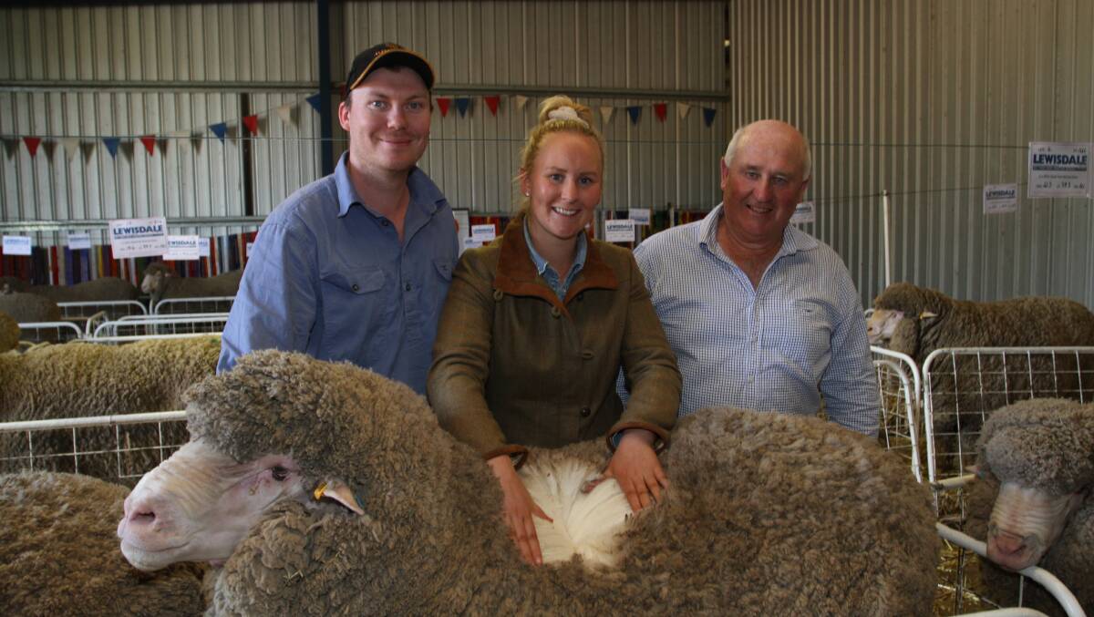 Baden Denholm (left), Olivia and Steve Fowler, Jumbuk Plains, Esperance. The Fowlers are 40 plus-year Lewisdale clients and purchased seven Lewisdale rams for their nucleus breeding program for an average of $4821 and to a $5250 top price.