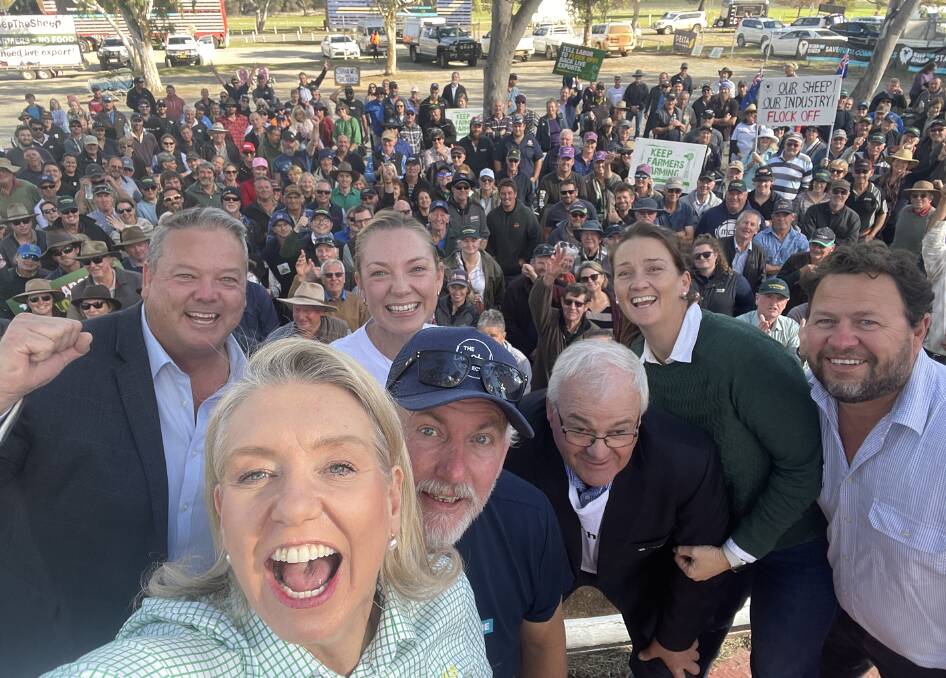 Nationals senator Bridget McKenzie took this selfie for Farm Weekly while on the rally stage, a flatbed truck, with Dawson, Queensland, Liberal National Party MP Andrew Willcox (left), who is on the Standing Committee for Agriculture, The Nationals WA outgoing member for the Central Wheatbelt Mia Davies, Keep The Sheep organiser and Port Hedland export depot owner Paul Brown, National Farmers' Federation vice president and WAFarmers president John Hassell, and Keep The Sheep organisers and The Livestock Collective directors Holly Ludeman and Steven Bolt, with some of the rally attendees in the background.