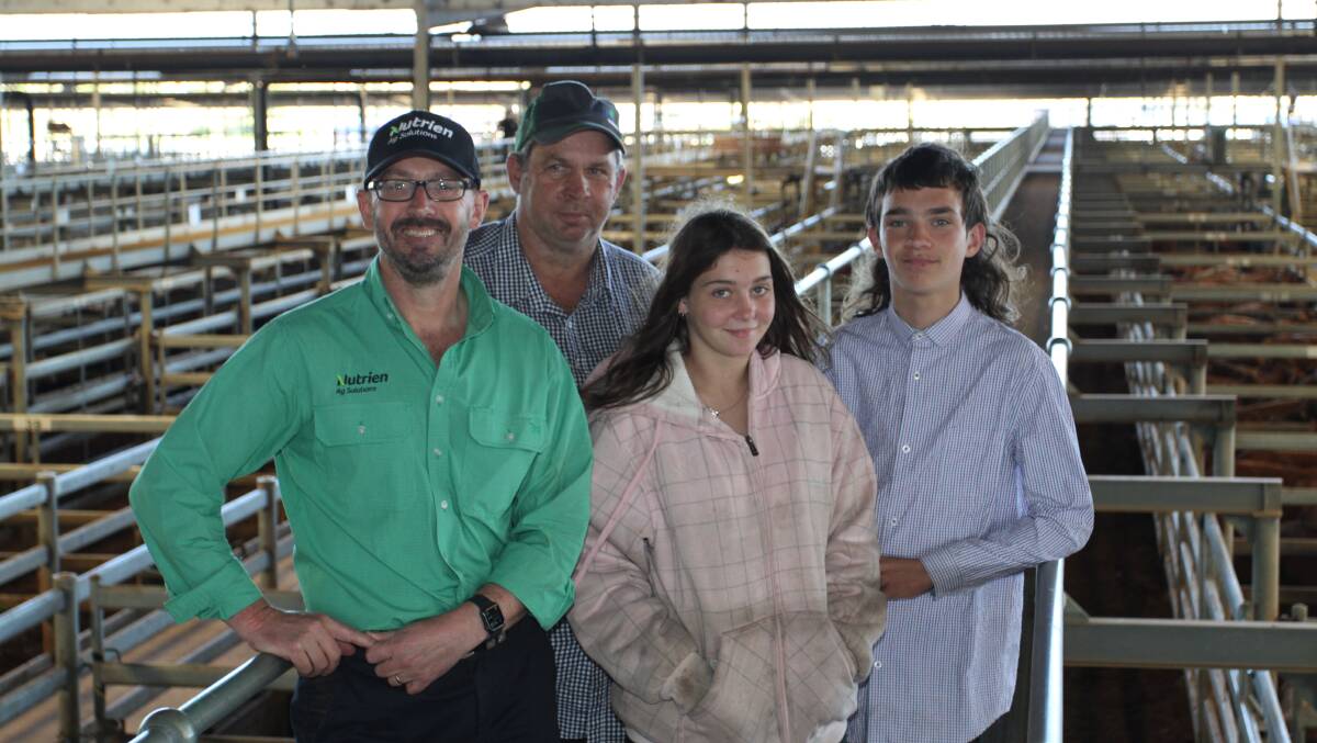 Nutrien Ag Solutions western region manager Andrew Duperouzel (left), with sale vendors Robert and Amy Mostert and Luke Jolley, Mosterts Dairy Pty Ltd, Keysbrook, at the Nutrien Livestock store cattle sale at the Muchea Livestock Centre last week. The Mostert family was the volume vendor in the local beef section, selling Angus cross steers to $1699 and heifers to the top local price of $1218.