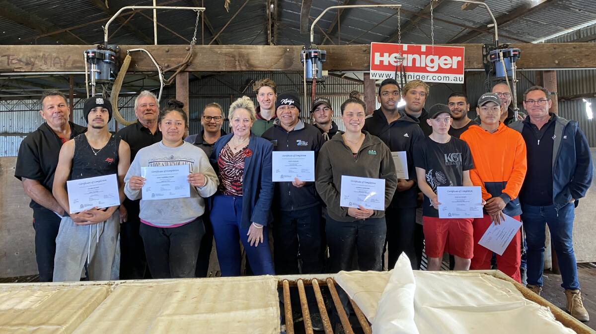Agriculture and Food Minister Alannah MacTiernan (front, third left) with graduates from the latest regional shearing and wool handling hub camp at Wellstead. In the back row are Heiniger representative and shearer Todd Wegner (left), Australian Wool Innovation trainers Kevin Gellatly and Amanda Davis (second and third left) and Western Australian Shearing Industry Association president Darren Spencer (right).