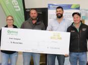 Amy and Brodie Cunningham accepting their $10,000 cheque at Optima Agricultures $250,000 prize event held at Nutrien Ag Solutions Pingelly last Wednesday, congratulated by Optima Agriculture general manager of operations Morgan Richards (third from left) and Nutrien Ag Solutions Pingelly branch manager Antony Sewell.