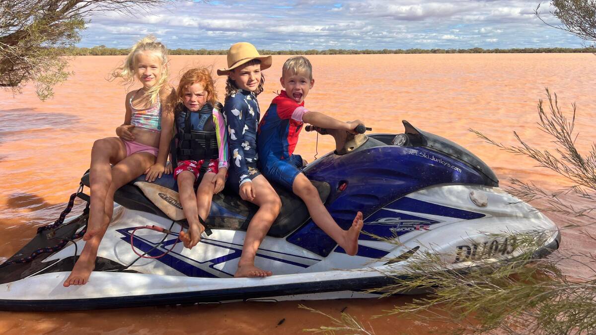 Chelsea Scorgie (left), 8, Eadie Lewis, 3, Riley Lewis 7 and Hunter Scorgie, 6, take the jet ski out to a claypan at Yarrabubba station, after recent rainfall. Photos by: Samantha Collins.