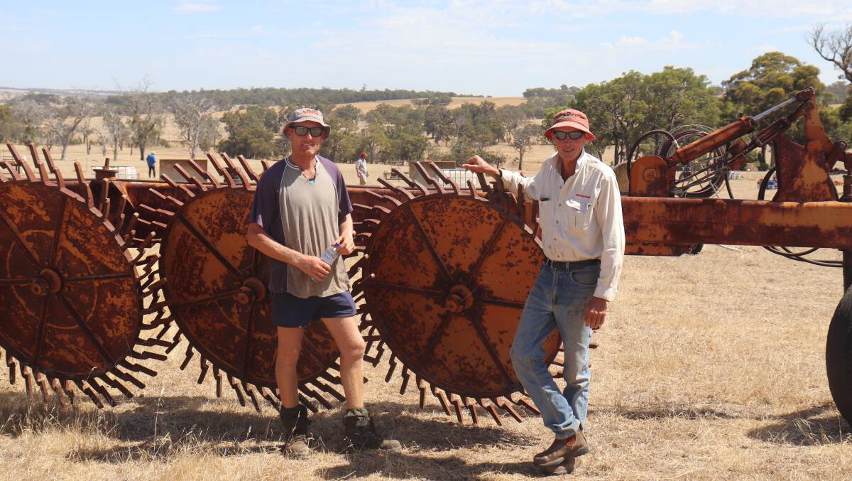 Richard Schinzig (left), Moodiarup and Dan Buller, Darkan looking over some of the items before the sale.