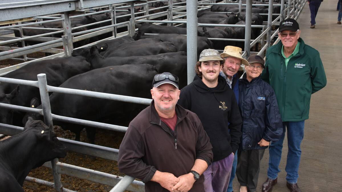 The Houden family, The Southden Trust, Redmond, got the sale underway offering and selling 54 PTIC Angus-Friesian heifers from their dairy operation, for between $1000 and $2100 to average $1665. In front of their pens were Mal (left), Owen, Des and Pat Houden and Nutrien Livestock, Mt Barker agent Harry Carroll.