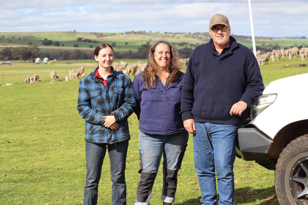 Lily (left) and Anna Jennings with Luke Edwards, Waverley Park, Beverley, have gone against the trend of time in Merino sheep breeding. 