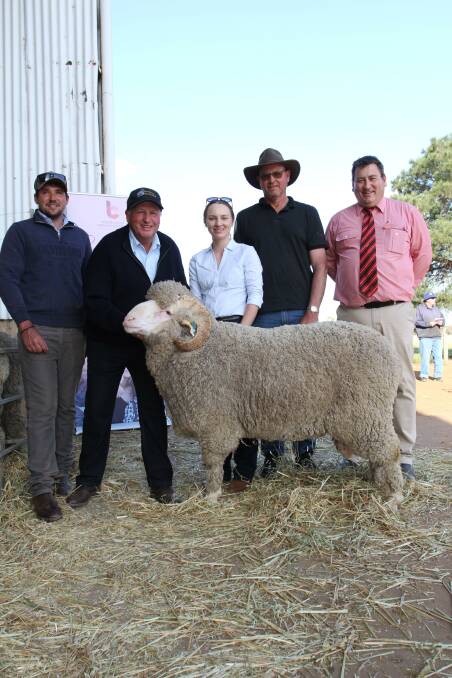 Woodyarrup co-principal Lachlan (left) and Craig Dewar, Woodyarrup, Jess White and Stuart Stoney, Broomehill and Elders stud stock manager Tim Spicer with the $11,000 second top-priced ram that was purchased by Mr Spicer on behalf of the Capel family, Bungulla Merino and Poll Merino stud, Manilla, New South Wales.