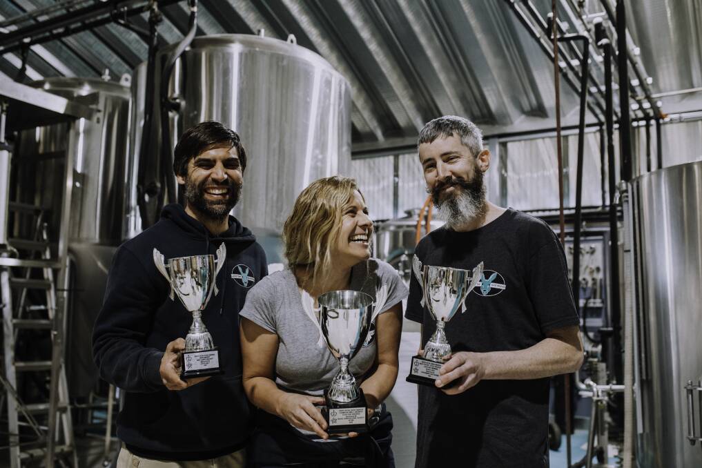 There were smiles at Lucky Bay Brewing as owners Nigel Metz (left), Robyn Cail and head brewer Rob Halford celebrate the fact the brewery has again won the Trophy for best beer at the 2022 Perth Royal Beer Awards, following winning Champion Small-Medium Brewery in 2021, and Champion Lager in 2020. Photo by Rosemary Henderson.