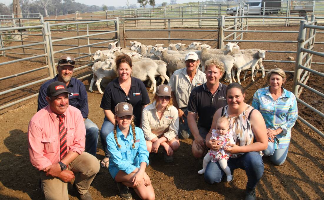 WM & CM Robertson, Boyup Brook, was the sales most prominent buyer of the Blackwood SheepMaster sheep with 13 rams costing to $6800 and average $4223 and 75 1.5-year-old and mature age ewes costing to $435 and average $337. With some of the ewes during loading were Elders Kojonup agent Jamie Hart (left), Blackwood SheepMaster connections Phil, Ginette, Rachel and Heidi Corker, Martin and Colleen (right) Bleechmore and buyers Wayde and Emma Robertson and their daughter Florence.