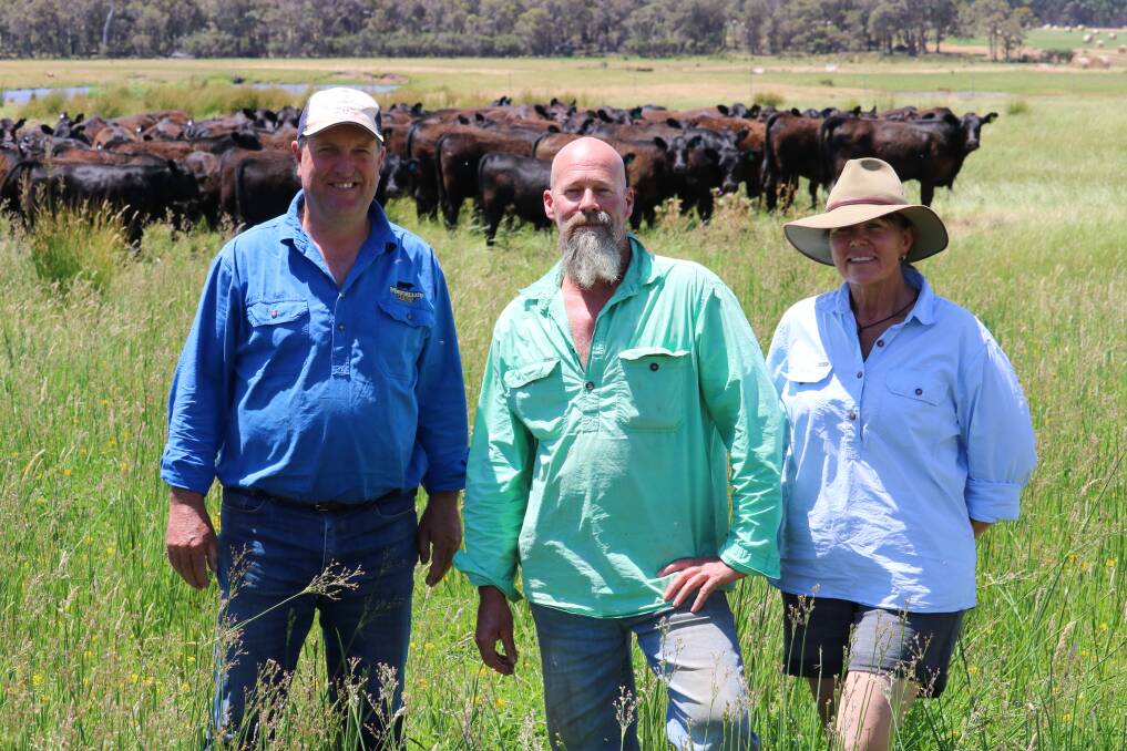 WA Angus Society vice chairperson Mark Muir (left), Manjimup, with Tomasi Grazing managers Kevin and Tracy Owen, Karridale and some of their 2021 drop Tomasi Grazing heifers.