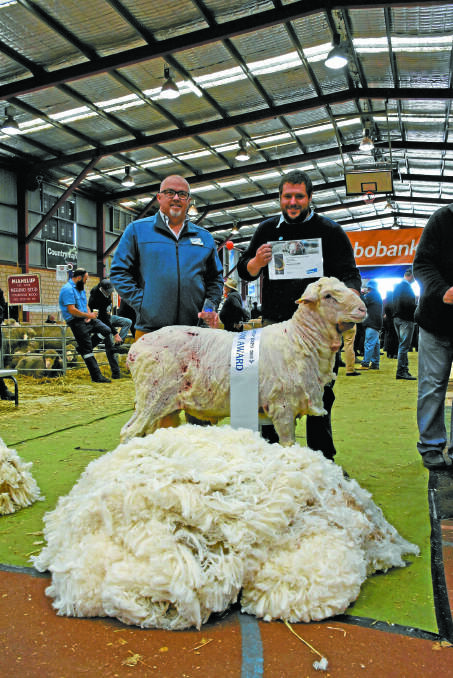 The PROram title was won by this Poll Merino sire exhibited by the Seymour Park stud, Highbury. With the winning ram were Elanco territory manager Paul Dugan (left) and Seymour Park co-principal Clinton Blight.