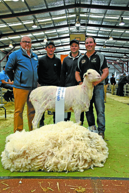 For a second year running the St Quentin stud, Nyabing, took top honours in the PROewe competition. With the stud's winning ewe were Elanco territory manager Paul Dugan (left), St Quentin's Dan Farrow and Corey Neilson and St Quentin principal Scott Crosby.