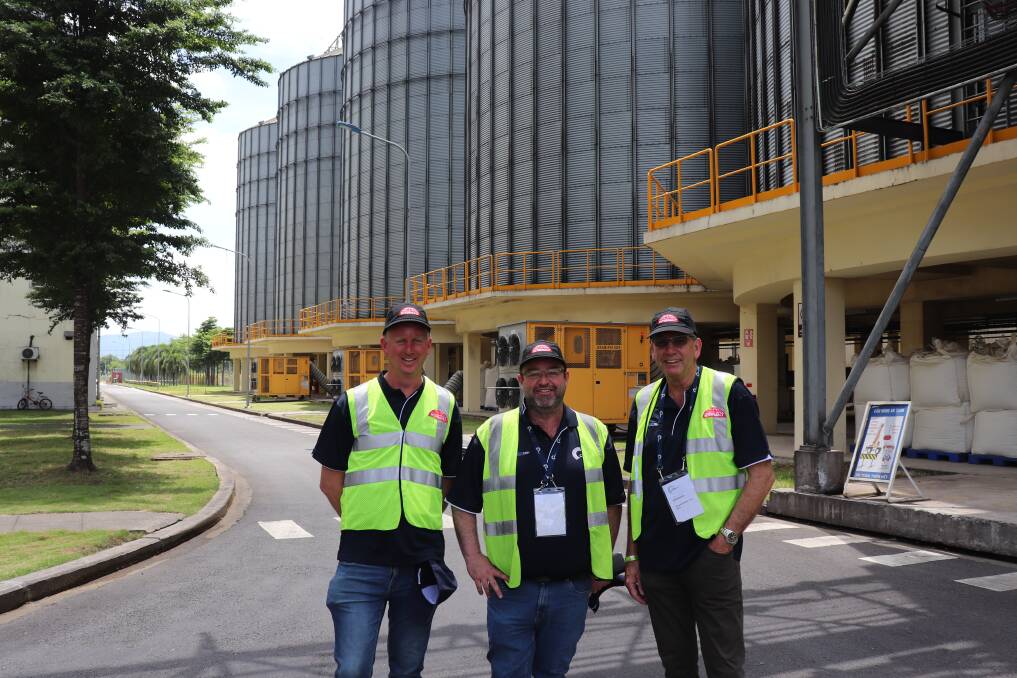 Hyden farmer Tyron Utley (left), with Viridis Ag assistant manager Mike Holt and Growers Advisory Council member Noel Heinrich, Carnamah, in front of some of the storage silos at Intermalt.

