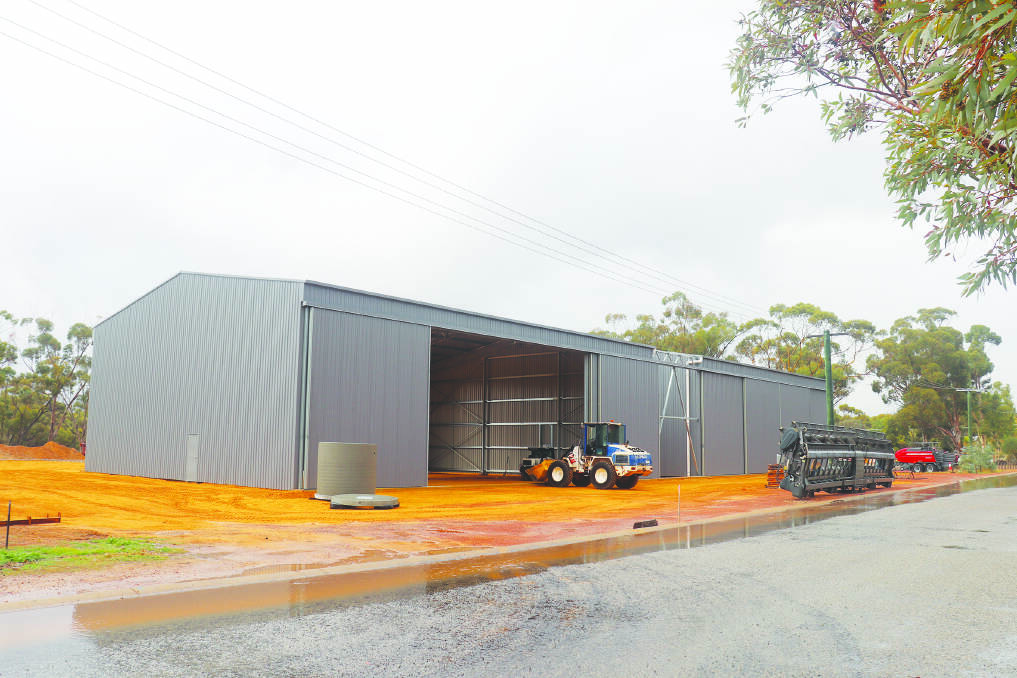 The street view of H Rushton & Co's new service centre in Brookton. The sheds provide drive-through access to an undercover washdown area behind.
