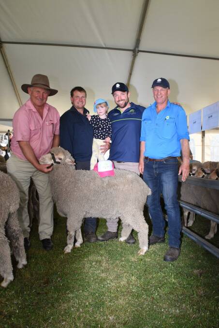 The Thompson family were happy to see this ram make $2600 as they were donating the proceeds to Active Farmers. With the ram were Elders stud stock representative Russell McKay (left), who purchased the ram for his client Tim Harris holding daughter, Kelsey, Badgebup, Active Farmers WA general manager Boyd Rae and Moojepin co-principal David Thompson.