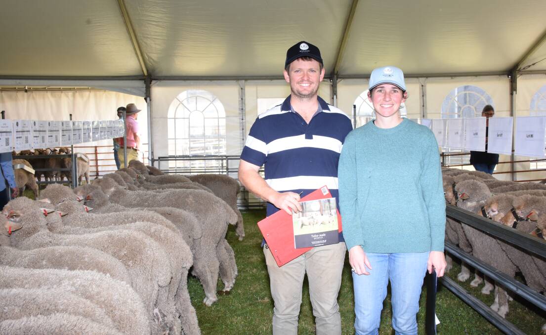 Looking over the line-up of rams before the sale were Alec and Naomi Rex, Westendale Grazing Co, Arthur River. In the sale the Rex family purchased six rams at a $2200 average.